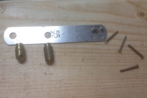 Spring steel strip and hardware: pre-assembly